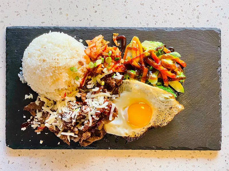 Savory beef bowl with rice, fried egg, kimchi & cheese at Funtime Sushi & Ramen & Tea Bar, a Asian Restaurant in Nashville