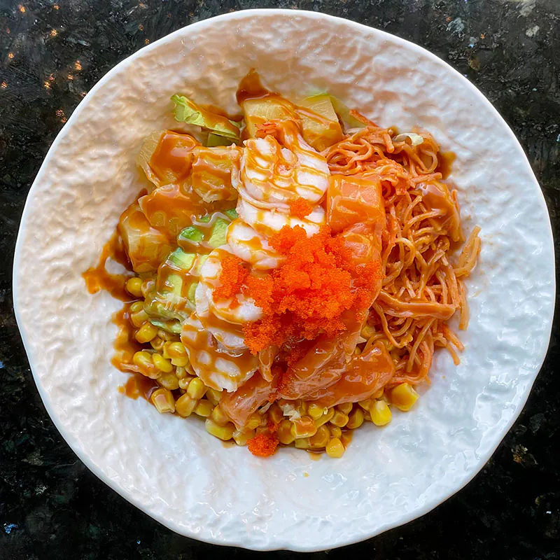 Fresh poke bowl with salmon, corn, tobiko & special sauce at Funtime Sushi & Ramen & Tea Bar, a Asian Restaurant in Nashville