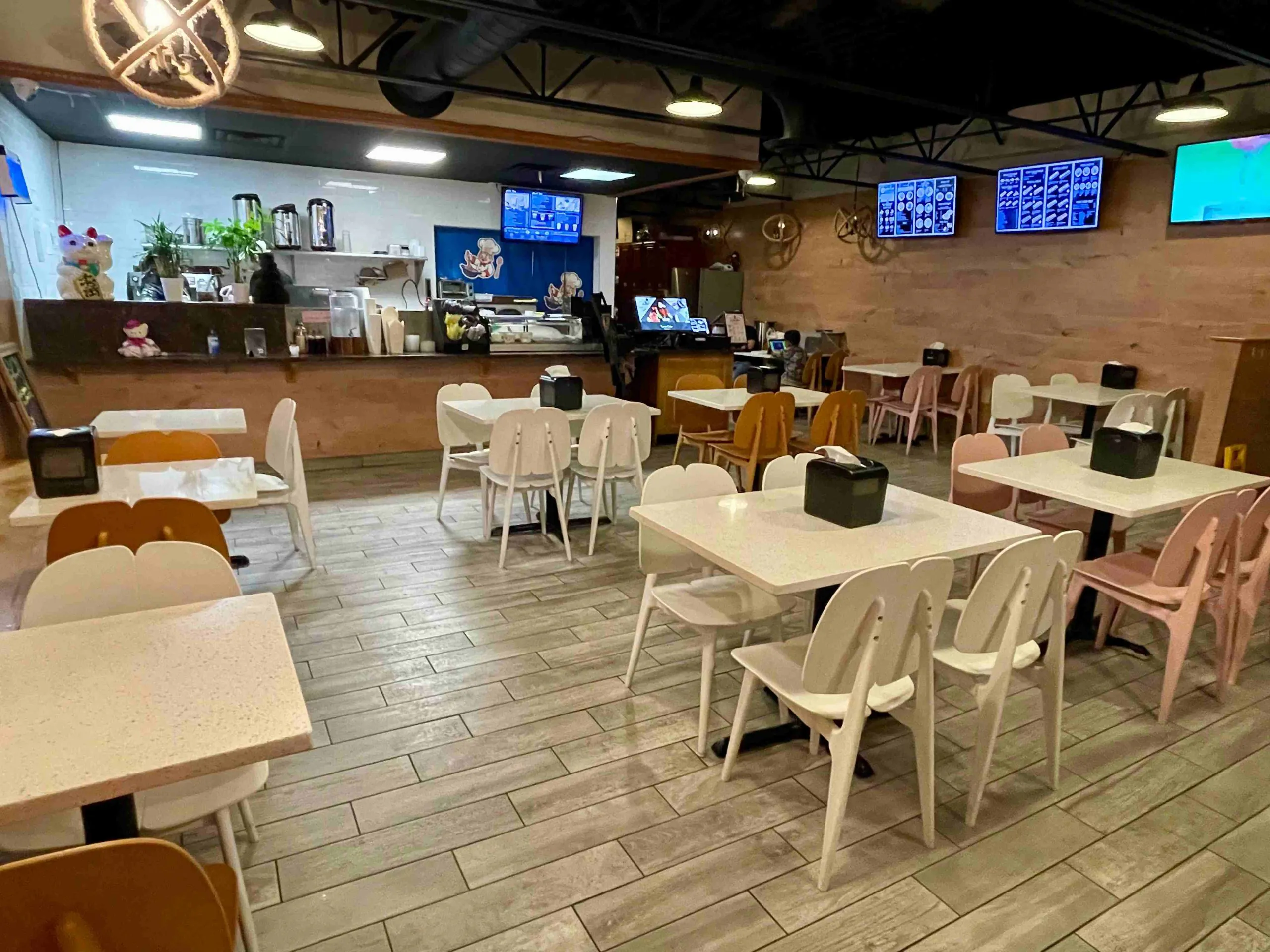 Spacious dining room with cozy vibe & TVs at Funtime Sushi & Ramen & Tea Bar, a Asian Restaurant in Nashville